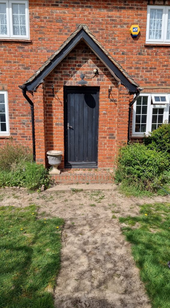 The backdoor area before installing the paving